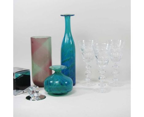 A set of three large cut crystal stem glasses, 22cm high, together with two M'dina coloured glass vases, a Villeroy and Boch 