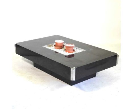 An Italian black formica Alveo coffee table, circa 1970's, by Willy Rizzo for Mario Sabot, of rectangular shape, with a reces