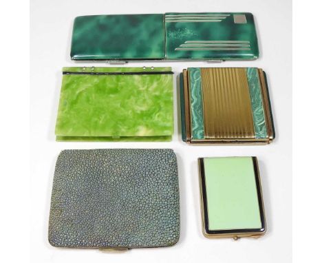 An Art Deco shagreen and gilt metal compact, of hinged design, 9cm wide, together with an enamelled vest case, a green bakeli