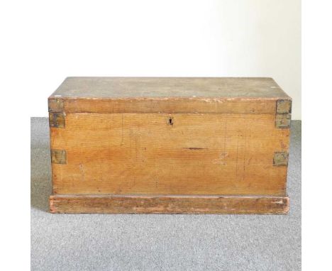 A 19th century pine trunk, with a hinged lid90w x 44d x 47h cm 