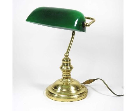 A brass desk lamp, with a green glass shade, 37cm high