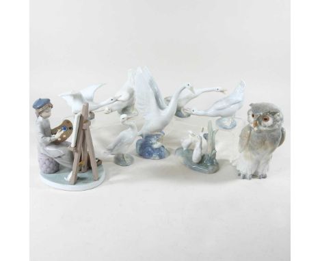 A Lladro figure of an artist, 18cm high, together with a collection of Nao and Lladro figures of birds and an owl (9)