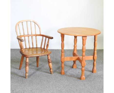 A child's ash and elm windsor style armchair, together with a handmade light oak occasional table (2)