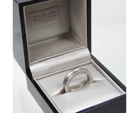 A Bulgari 18 carat white gold ring, of plain ribbed design, inscribed to one side, 5.8g, size P, in original boxOverall condi