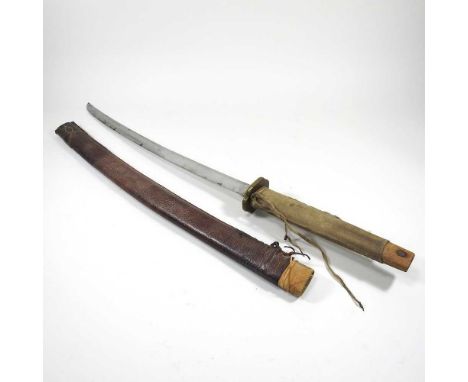 An early 20th century Japanese sword, with a curved steel blade and leather scabbard, with suspension ring, 86cm long