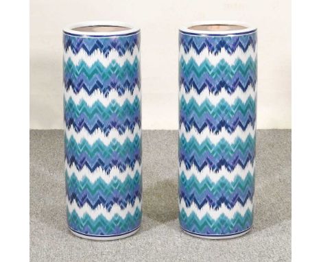 A pair of blue and white stick stands, with zig zag decoration, 60cm high (2)