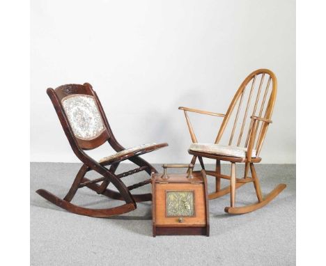 An Ercol style spindle back armchair, together with an early 20th century folding chair and a Victorian oak coal purdonium (3