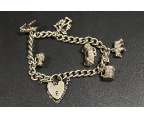 HEAVY HALLMARKED SILVER CHARM BRACELET 