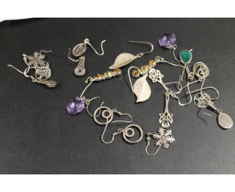 A QUANTITY OF PAIRS OF SILVER EARRINGS 