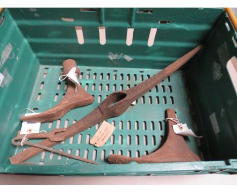 A TRAY CONTAINING VINTAGE PICK AXE HEAD, CAST COBBLERS BOOT LASTS ETC