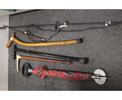 A COLLECTION OF VINTAGE STICKS, UMBRELLA, SHOOTING STICK ETC