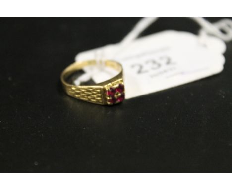 A FOUR STONE RUBY STYLE RING STAMPED 18CT - APPROX WEIGHT 3.5  G