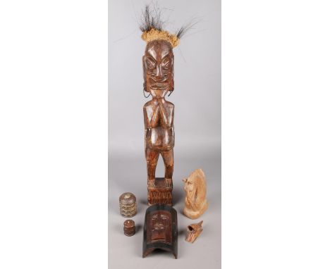 A quantity of treen. Including large tribal figure, brass inlaid trinket box, mask, etc.  