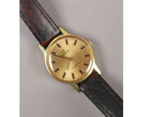 A ladies Omega Geneve manual wristwatch on leather strap.  