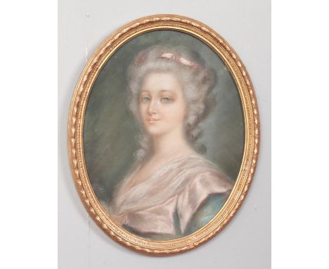 A pastel portrait of a maiden, in gilt oval frame.  