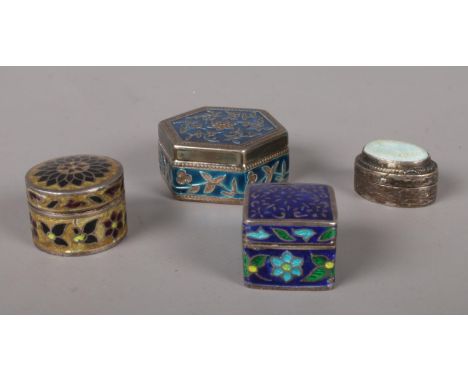 Four silver enamel pill boxes.  