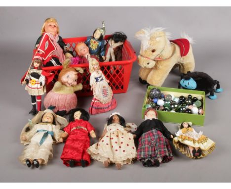 A box of 1950's dolls with a Donkey, Spider, Rabbit and vintage marbles. Comprising of bisque dolls in national dress as exam