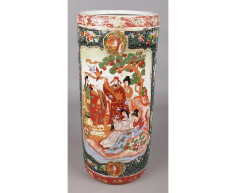 An oriental floor vase/stick stand. Decorated with figures and flowers.  