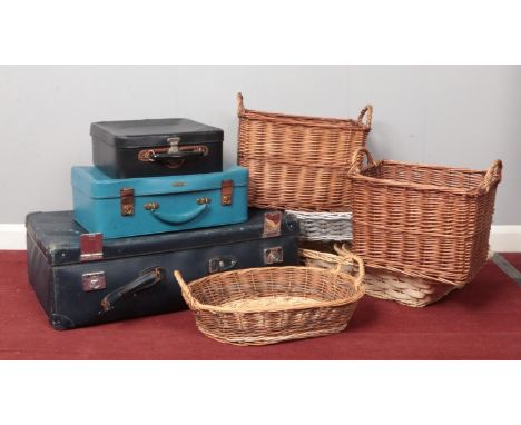 Three vintage suitcases &amp; a quantity of wicker baskets.  