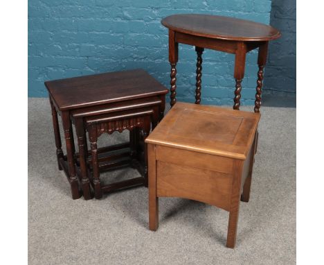 Three pieces of furniture. Includes oak nest of three tables, oak barley twist occasional table and a commode.  