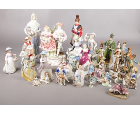 A box of ceramic figures. Including Lladro style, Leonardo Collection, etc.  