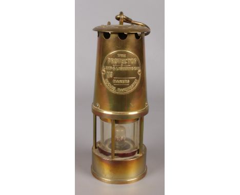 A reproduction electrified Protector Lamp &amp; Lighting Co Ltd miners lamp. Number and Makers blank. Eccles, Manchester.  Ne