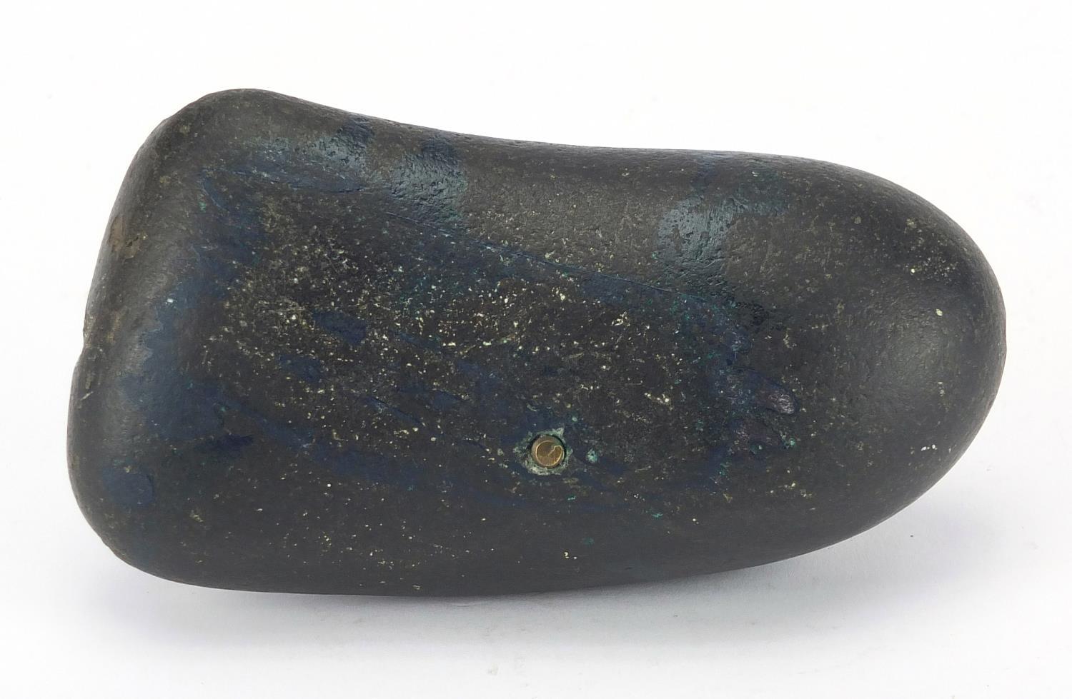 Early Islamic black stone engraved with Arabic script, 14cm wide For