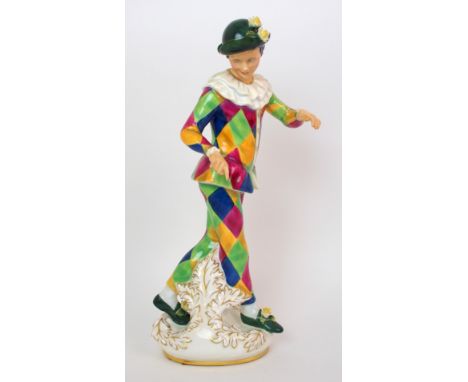 A Royal Doulton "Harlequin" figure  Royal Doulton mark to underside and further marked "H.N. 2737 modelled by Douglas Tootle 