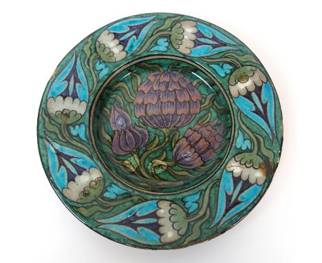 A William De Morgan Arts & Crafts painted ceramic plate circa 1890, green glazed plate decorated with purple flower buds to c