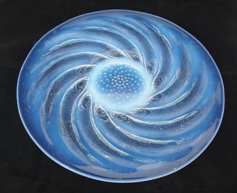 A Rene Lalique moulded opalescent glass "Poissons" plate circa 1931, conforming fish to exterior, moulded "R. LALIQUE" to cen