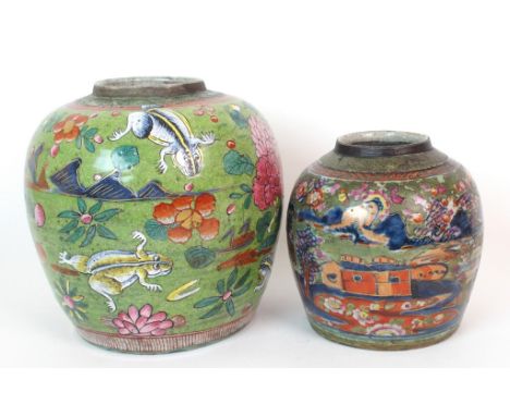 A Chinese clobbered ginger jar painted with pagodas, salamanders and foliage, 21cm high, and another (damaged), 16cm high (2)