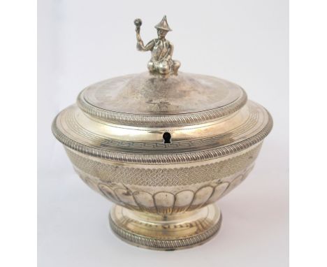 A late George III silver tea caddy by Peter and William Bateman, London 1807, of circular form, the half lobed body tapering 