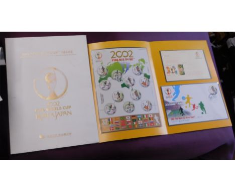 South Korea 2002 World Cup Football stamp pack containing SG MS2598a/e, u/m miniature sheet, FDC and pre-paid souvenir postca