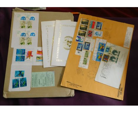 United Nations 2x philatelic envelopes posted to London cancelled New York and Geneva, 2x UN Complimentary folders with sport