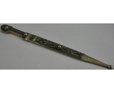 A white metal and plated Georgian dancing sword, with filigree decorated handle and scabbard. L. 43cm