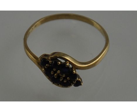 A 9ct gold Art Deco sapphire cluster ring