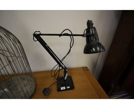 Black Anglepoise style lamp