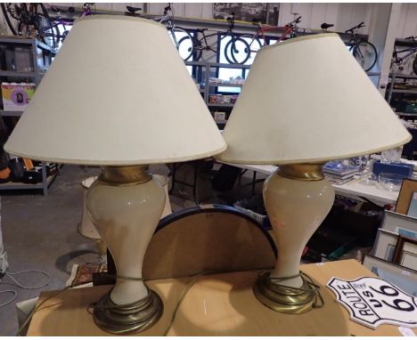 Pair of brass and ceramic table lights with shades, H: 70 cm including shade, crazing to ceramic but no chips or cracks. All 