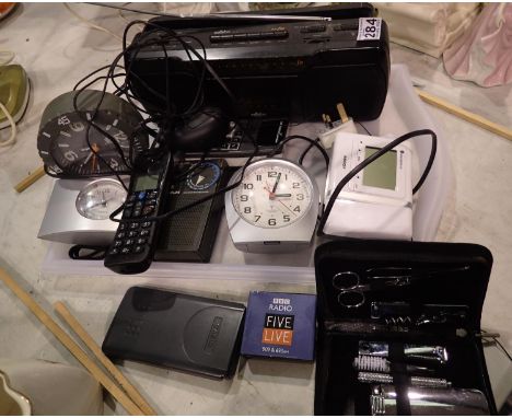 Mixed radios and clocks etc. All electrical items in this lot have been PAT tested for safety and have passed. This does not 