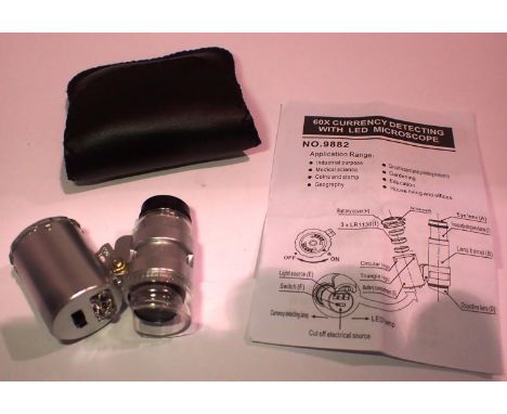 60x currency/jewellery loupe with LED microscope in pouch, with instructions. P&amp;P Group 1 (£14+VAT for the first lot and 