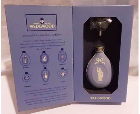 Boxed Wedgwood Jasperware powder blue perfume bottle. P&amp;P Group 1 (£14+VAT for the first lot and £1+VAT for subsequent lo