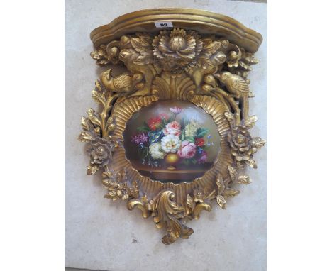 A Victorian style gilt bracket with painted cartouche - 51cm h x 45cm W 