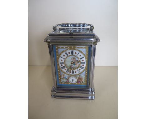 A carriage clock with alarm striking on a gong, with porcelain dial and panels, 15cm tall, with later nickel plating - not ru