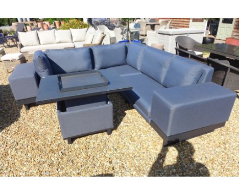 A Bramblecrest Jasmine Square modular 3 seat sofa with removable arm and an adjustable table