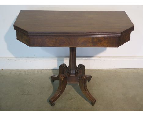 A 19th Century mahogany foldover card table on a quatrefoil base - 89cm wide 