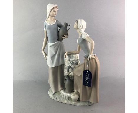LARGE NAO GROUP OF MAIDENS AT A WELL, 40cm high