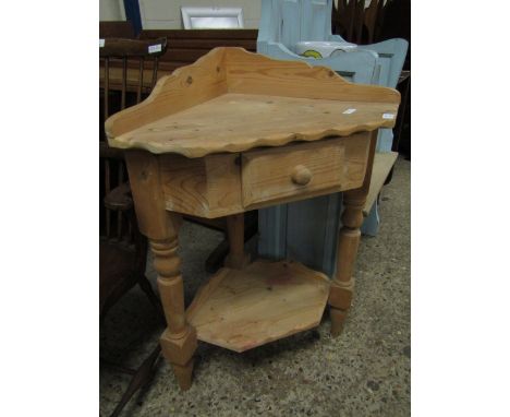 WAXED PINE CORNER STAND FITTED WITH SINGLE DRAWER WITH OPEN SHELF 