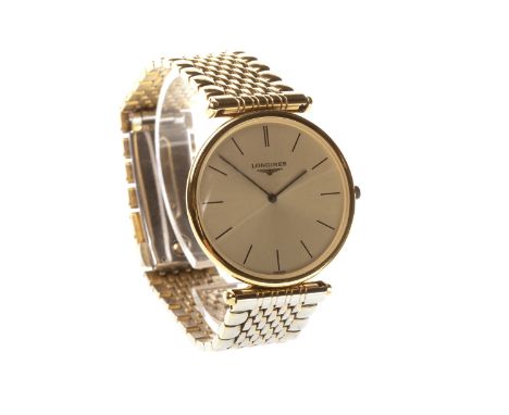 GENTLEMAN'S LONGINES LA GRAND CLASSIQUE DE LONGINES GOLD PLATED QUARTZ WRIST WATCH, the round dial with applied baton hour ma