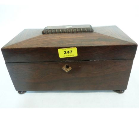 An early 19th century rosewood sarcophagus tea caddy with wheel engraved mixing bowl. 11' wide