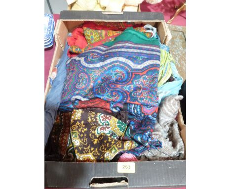A box of vintage scarves and a Deco style umbrella